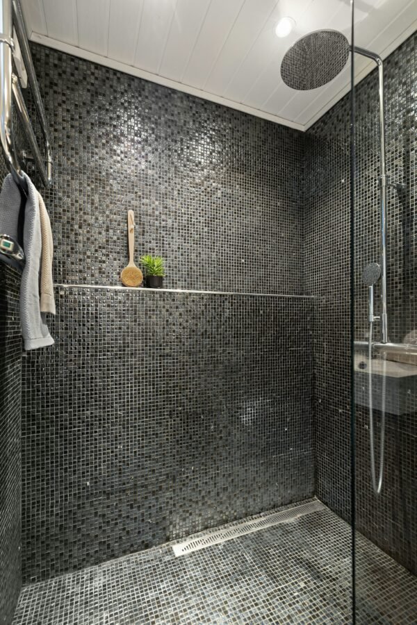 mosaic tiled walk in shower by trusted remodelers in Terre Haute