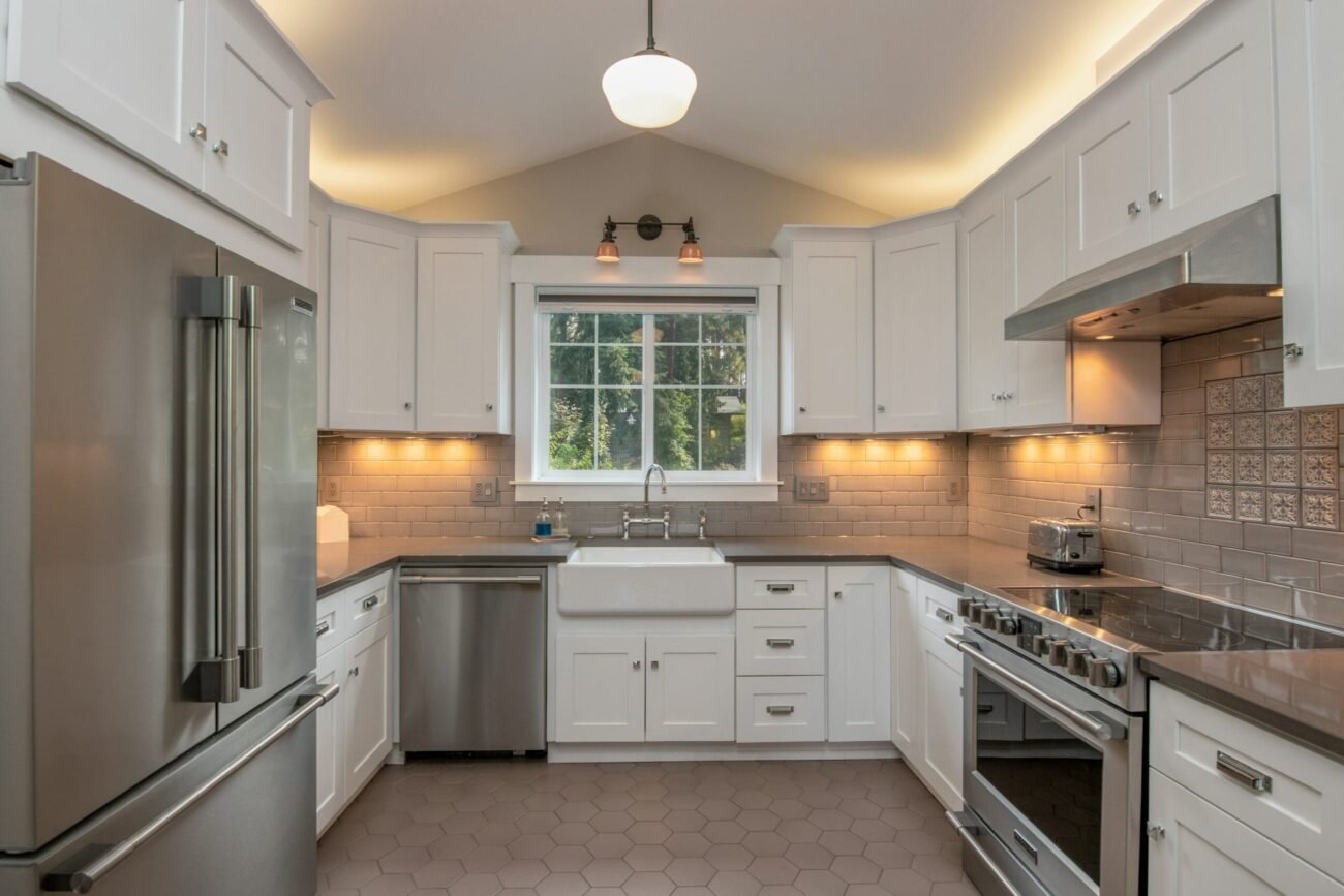 white kitchen remodel with white subway tile