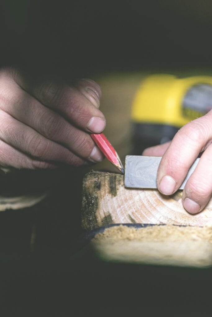 marking a piece of wood for a remodeling project