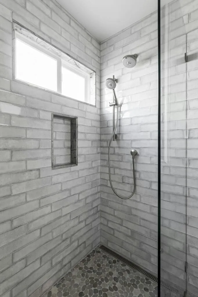 shower with grey tiles