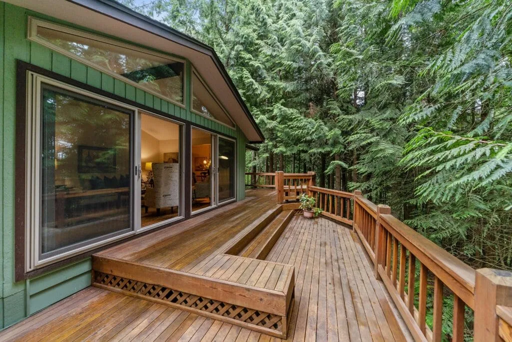 Pressure-treated wood deck in Indiana sealed and spaced to handle rain, snow, and humidity