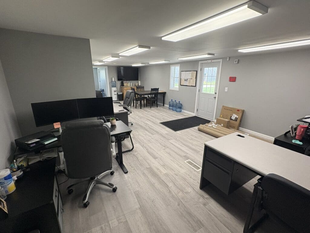 AC Grain office remodel — open-concept area after wall removal in Dana, Indiana
