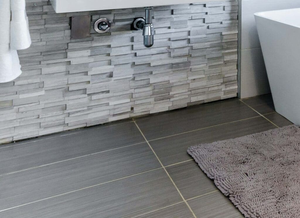 Slip-resistant tile flooring in a modern walk-in shower