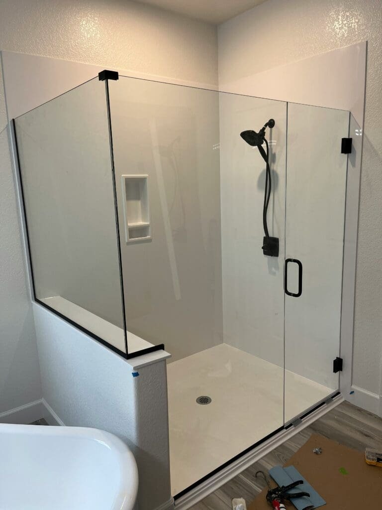 New walk-in shower with grab bars, low-threshold entry, and non-slip flooring in Terre Haute home