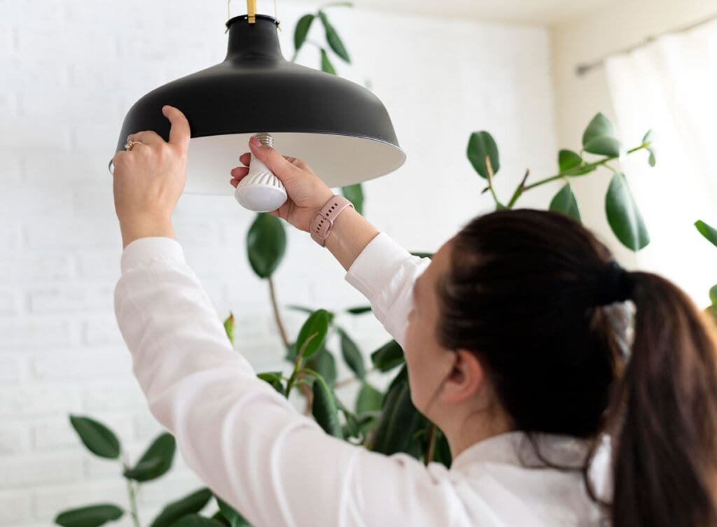 Upgrading an exterior light to a brighter LED for safer winter steps