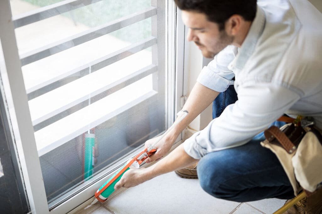 Re-caulking interior window trim to stop drafts in winter