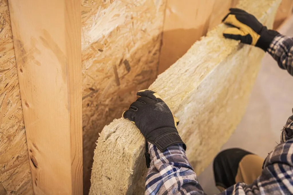 Fiberglass wall insulation installed in a new construction framed wall in Indiana