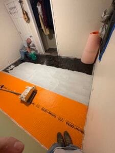 Bedroom installing the Ditra