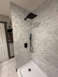 Left wall with rain shower head, valve and wand