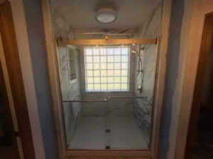 Shower Remodel In Terre Haute After Using Kohler Luxstone Walls In Calacatta Gold