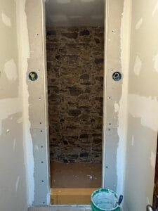 back wall of shower tiled