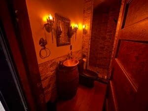 corner view with main light off and just goblet and candel lights on