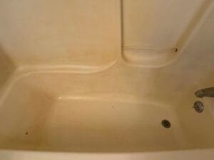 Close up of the iron stained tub