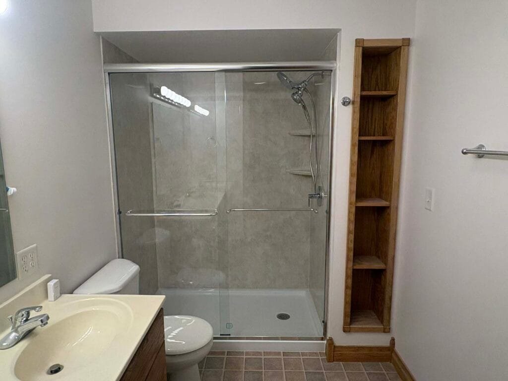 After of the walk in shower with Travertine shower walls