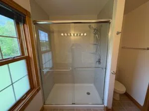 After of the walk in shower with Roman Stone shower walls