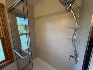 Close up of the Roman Stone shower walls